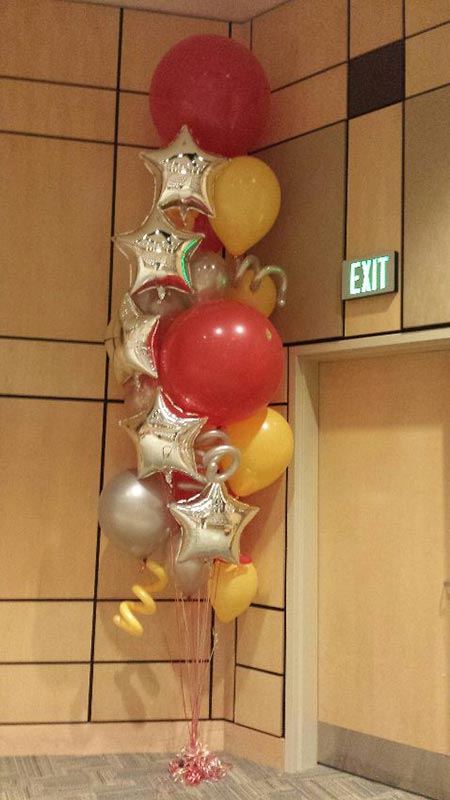12ft tall ballon bouqet with stars and 3' ballons